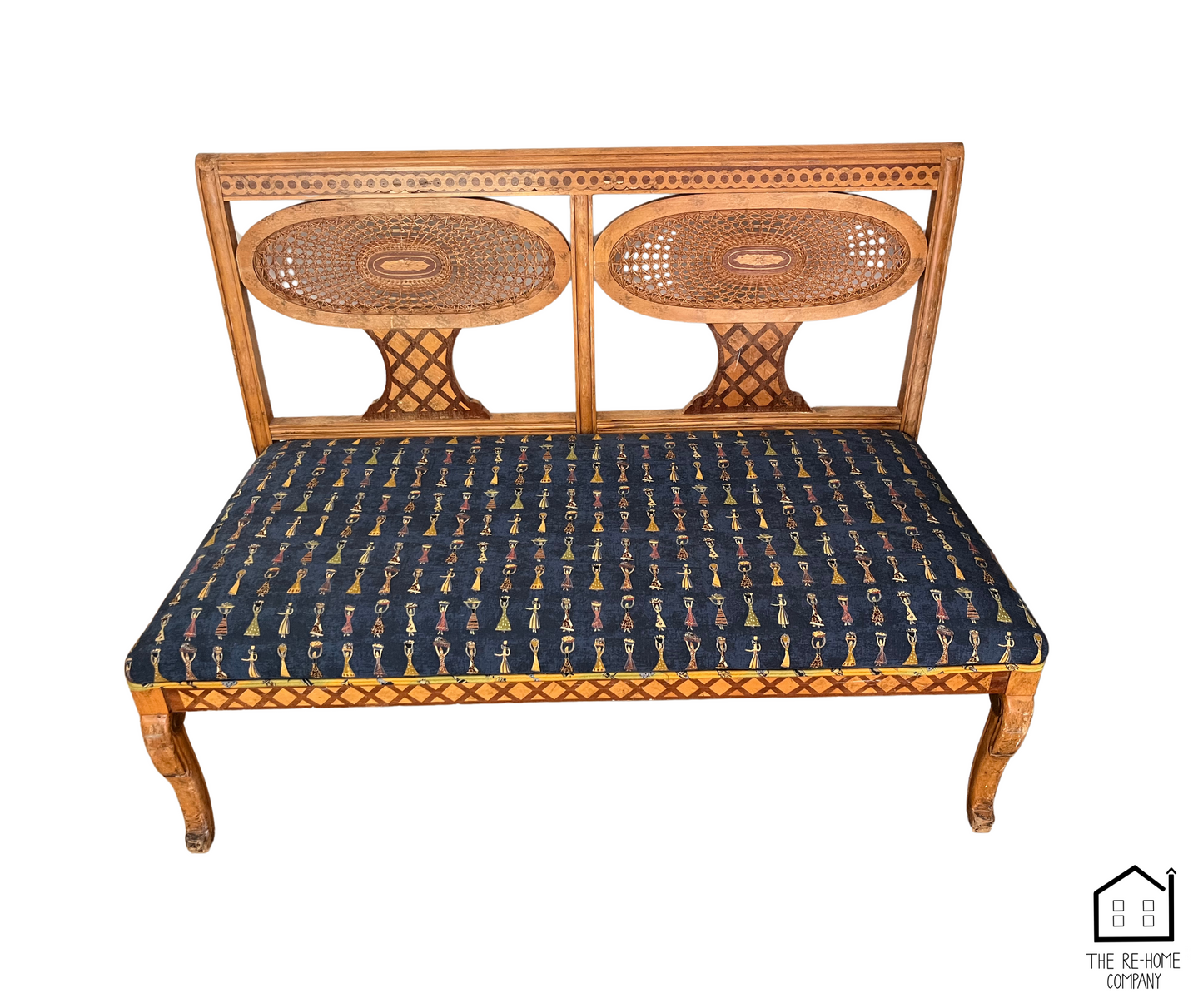 Ornate Wooden Bench with Woven Backrest and Patterned Upholstery front view